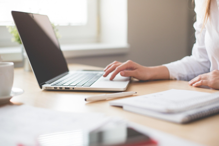 Image of office worker at desk